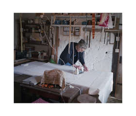Susan Bosence ironing in the studio